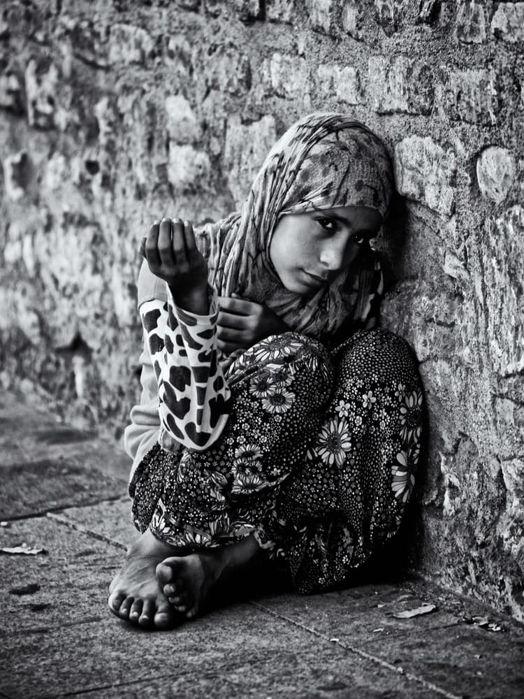 Pensive Child Street Scene by Marco Tagliarino — canvas wall art
