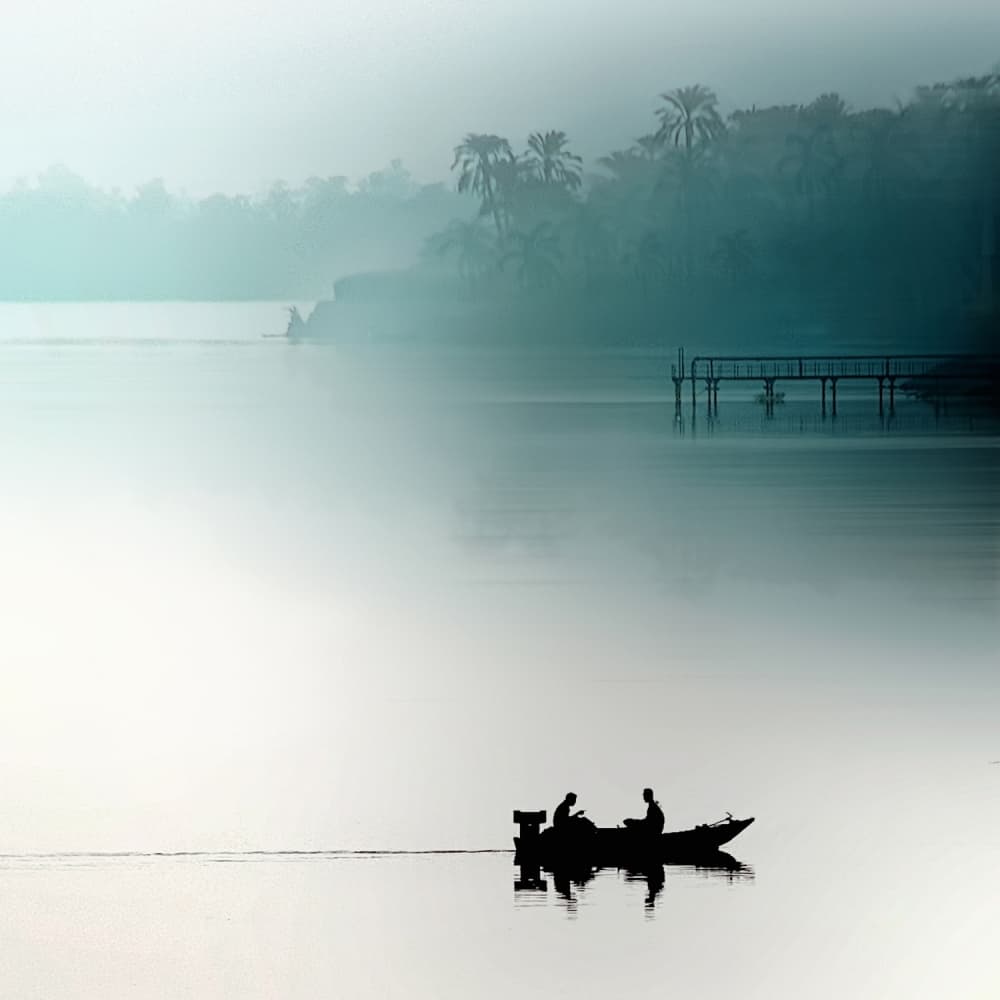 Misty Lake Boat by Piet Flour — canvas wall art