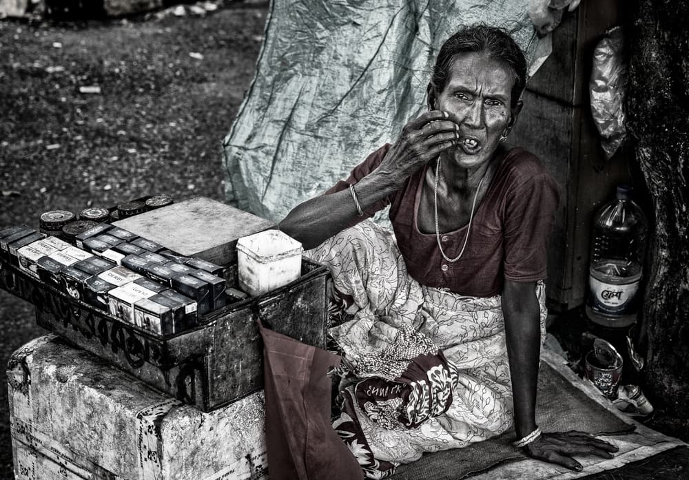 Street Vendor Portrait by Joxe Inazio Kuesta Garmendia — canvas wall art