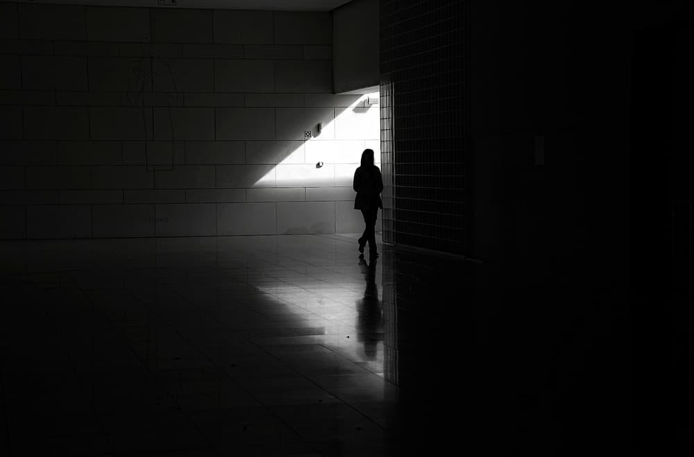 Woman Walking Into Light by Fernando Alves — canvas wall art
