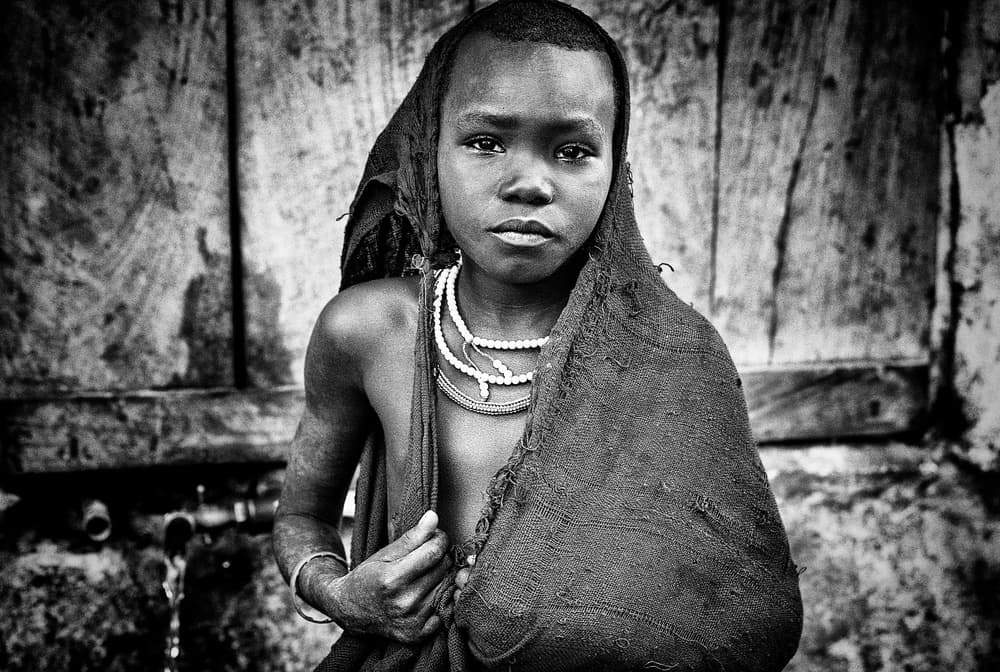 Pensive African Child by Joxe Inazio Kuesta Garmendia — canvas wall art