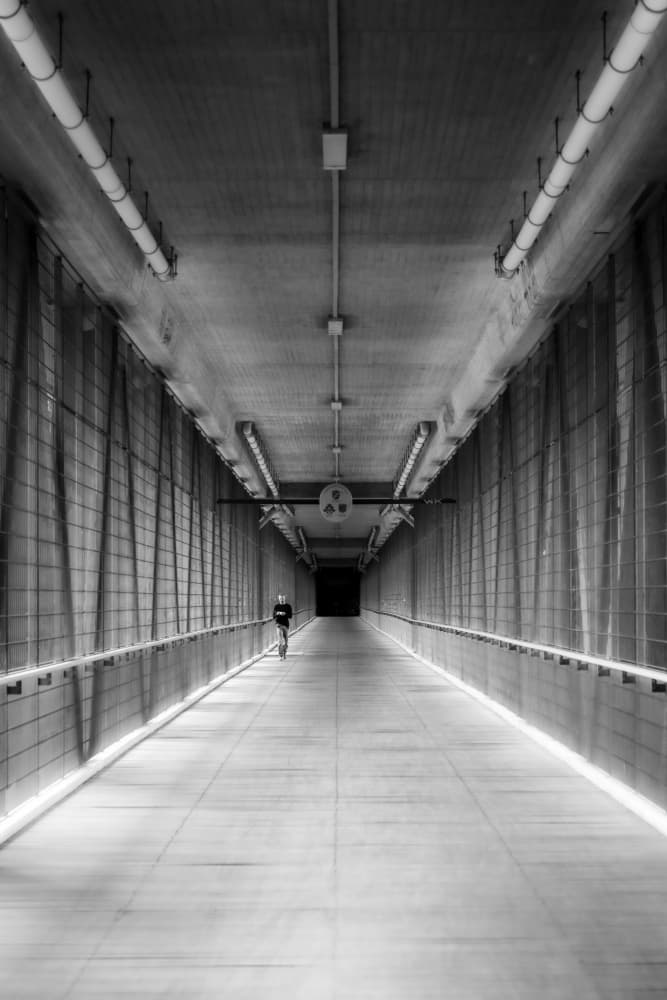 Solitary Figure in Tunnel by Andy Dauer — canvas wall art