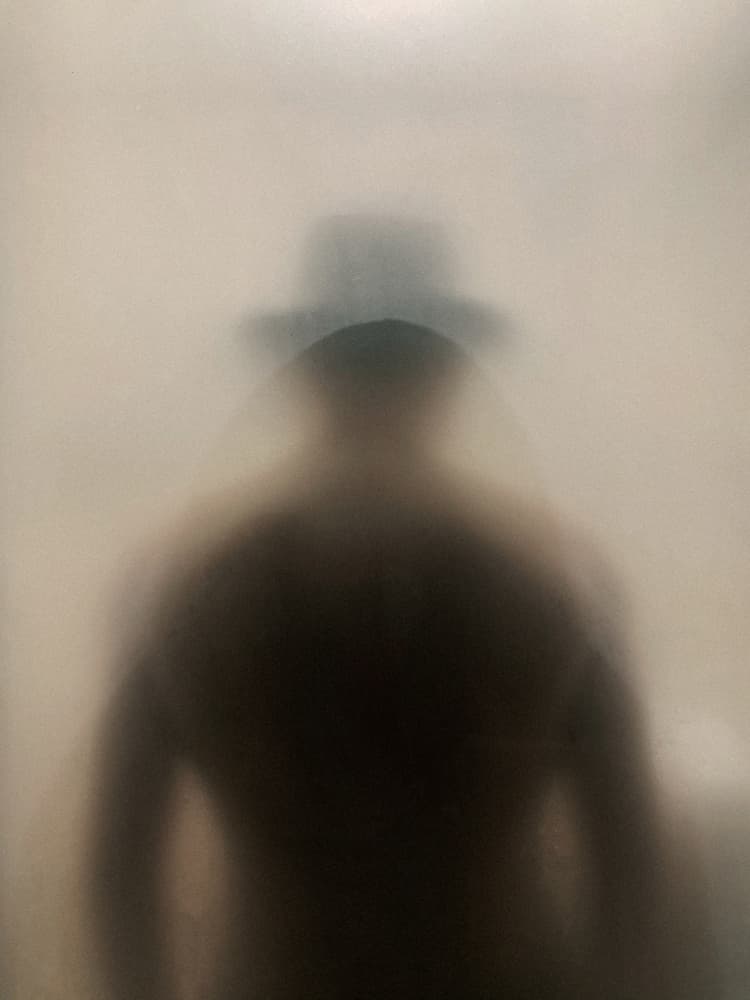 Mysterious Man in Hat by Bingo Z — canvas wall art