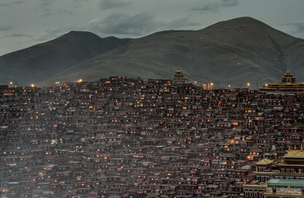 Illuminated Tibetan Village by Sarawut Intarob — canvas wall art