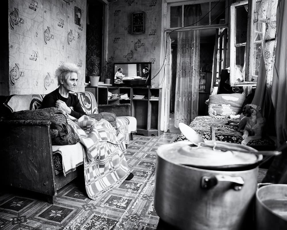 Elderly Woman At Home by Marcel Rebro — canvas wall art