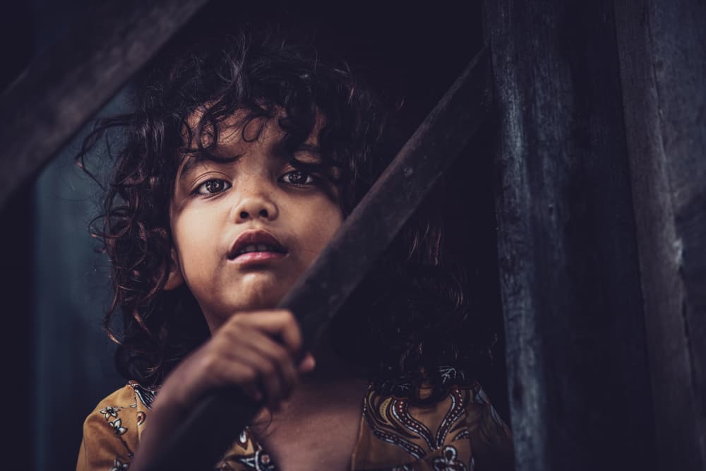 Pensive Child's Gaze by Marco Tagliarino — canvas wall art