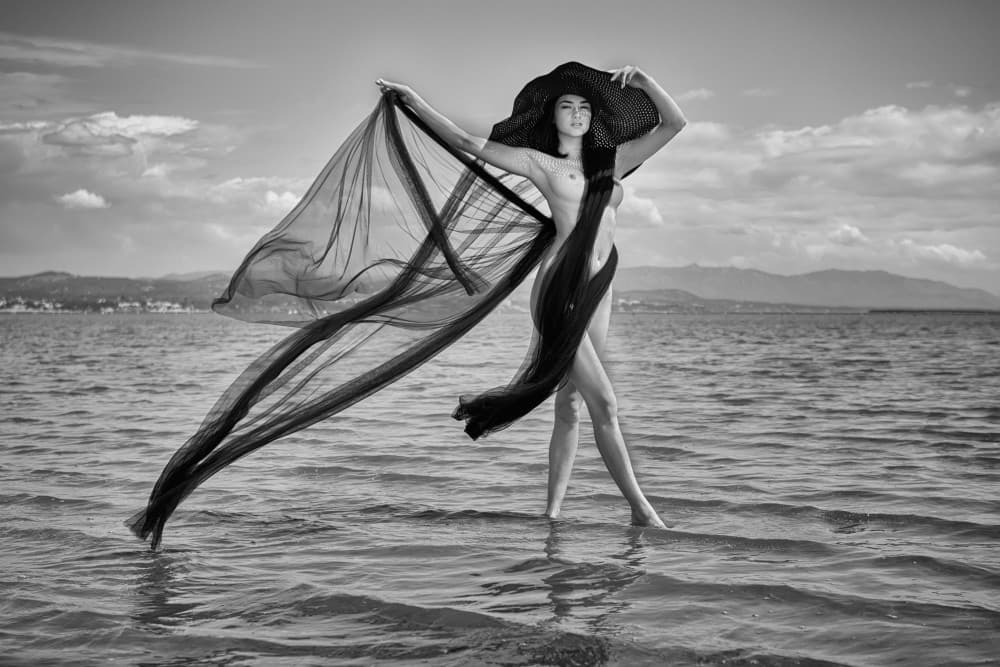 Elegant Woman Flowing Fabric by Joan Gil Raga — canvas wall art