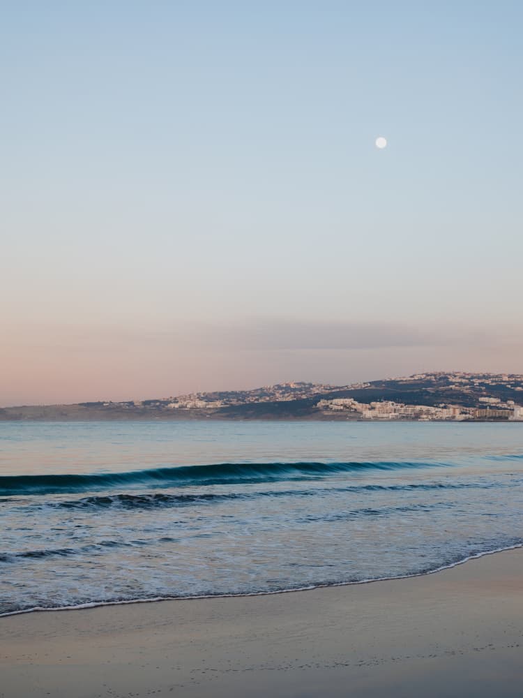 Sunset and the moon in Morocco by Photolovers — canvas wall art