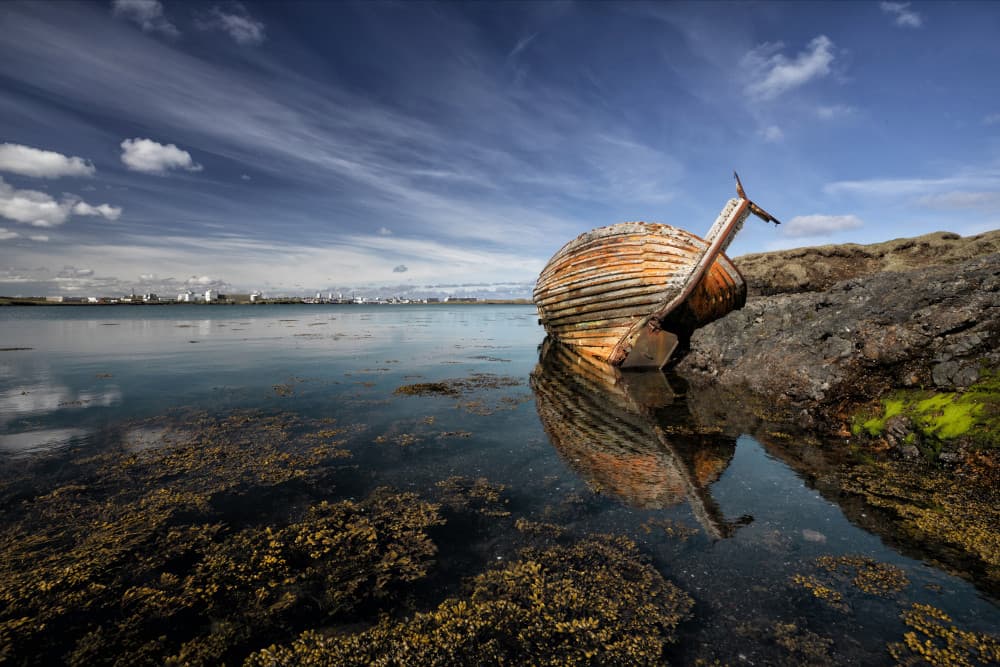 Abandoned Boat Reflection by Þorsteinn H. Ingibergsson — canvas wall art