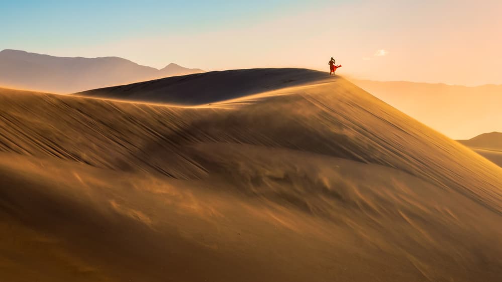 Woman on Golden Desert Dune by John J. Chen — canvas wall art