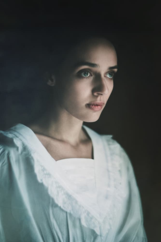 Serene Woman in White by Magdalena Russocka — canvas wall art