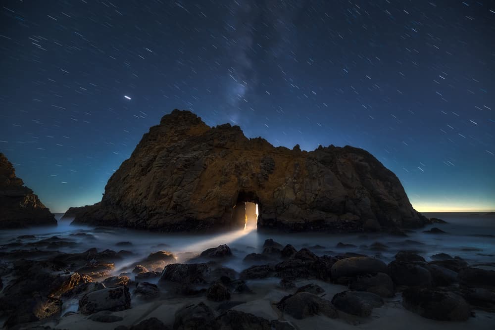 Mystical Sea Arch Glow by Aidong Ning — canvas wall art
