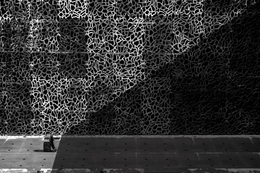 Lone Figure Shadow Play by Ekkachai Khemkum — canvas wall art