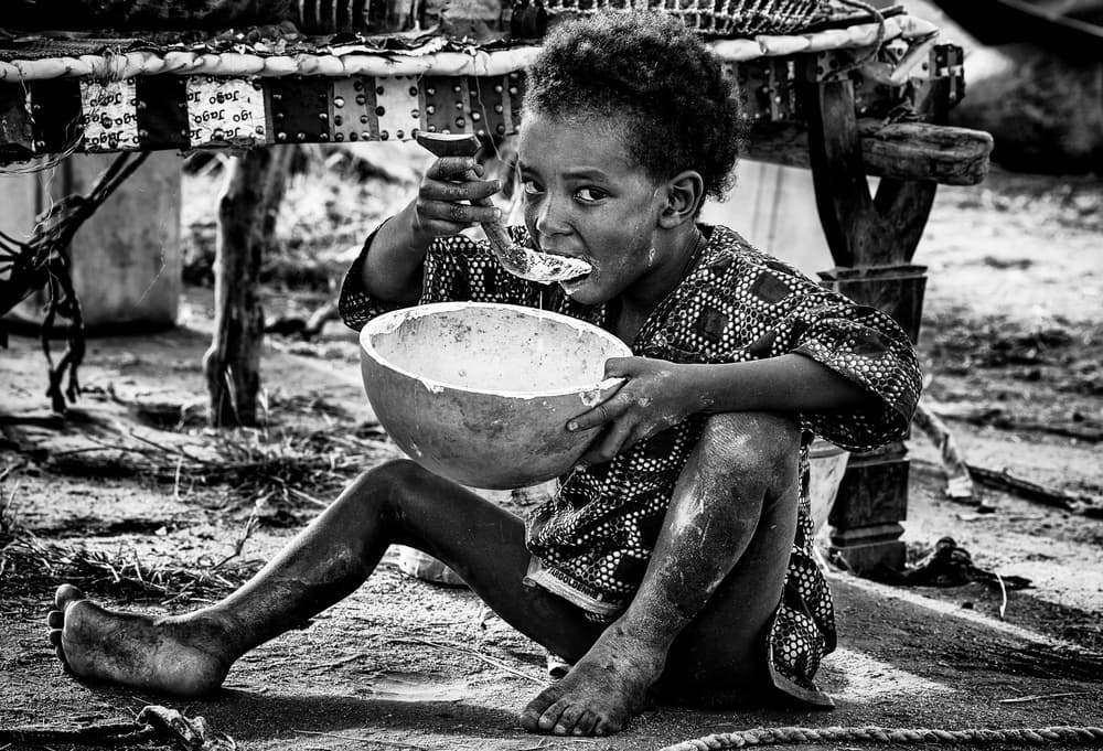 Boy's Simple Meal by Joxe Inazio Kuesta Garmendia — canvas wall art
