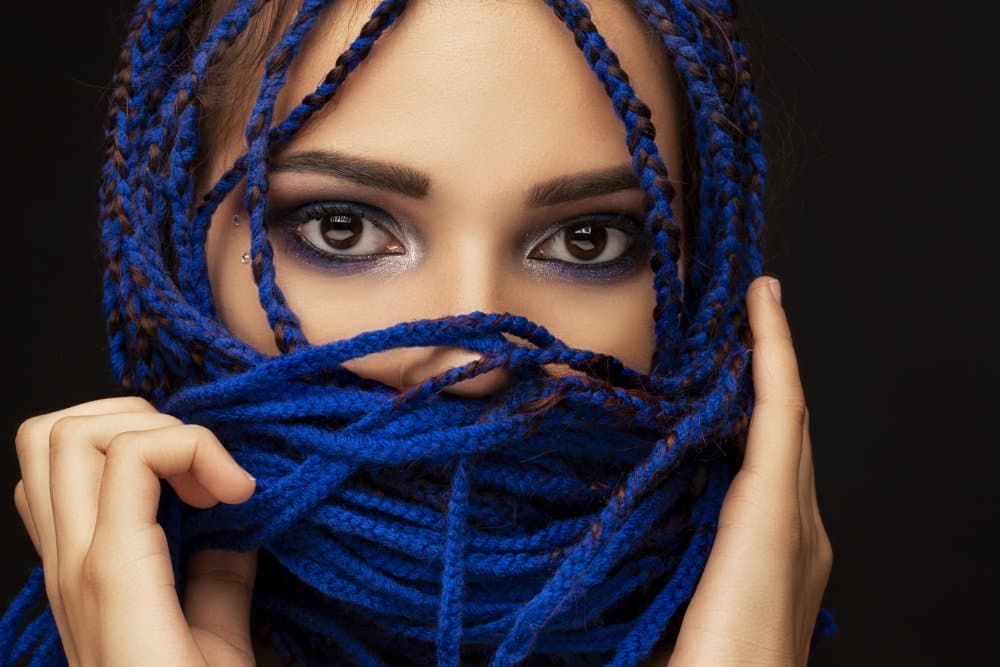 Mysterious Blue Braids Portrait by Carmen Watkins — canvas wall art