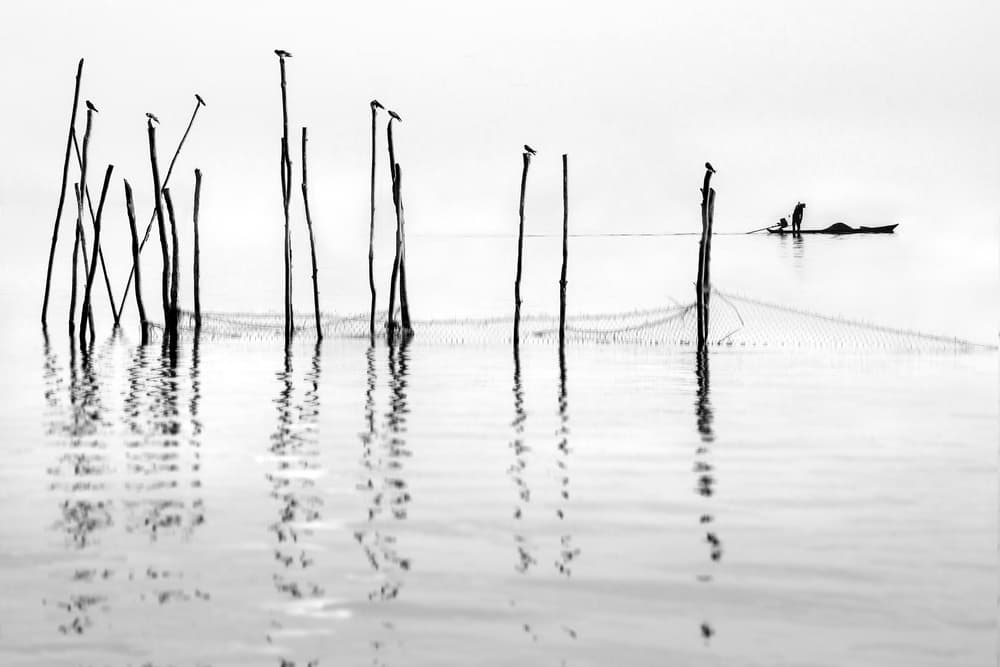Calm Waters Fishing by Ekkachai Khemkum — canvas wall art