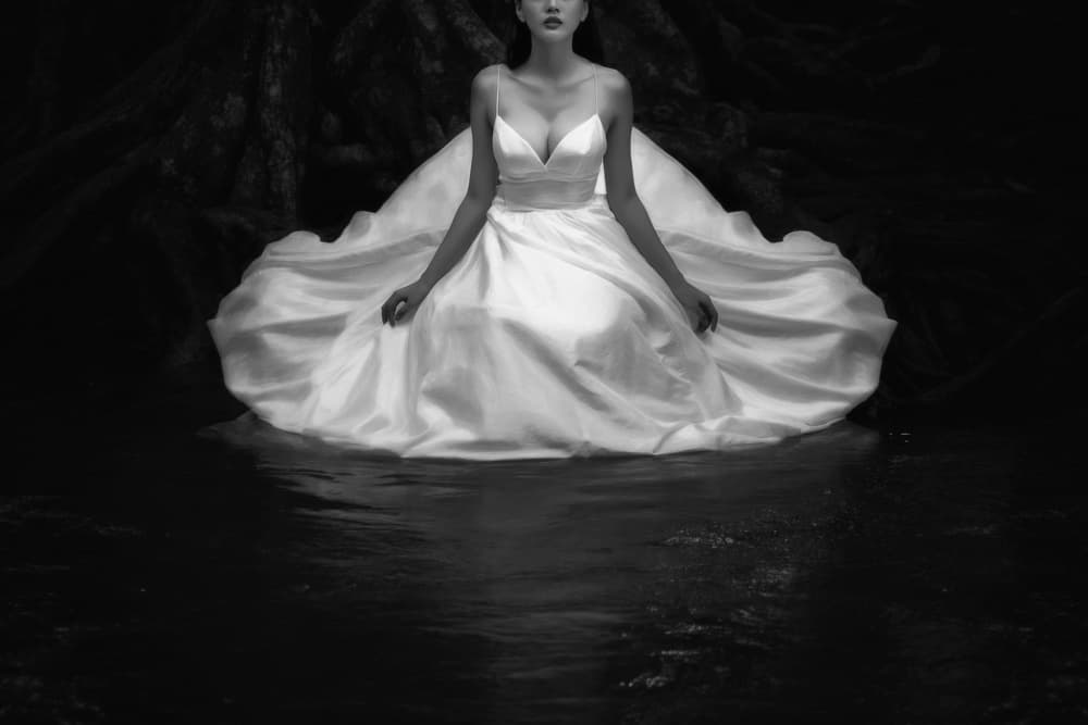 Elegant Woman in Dark Water by ADIREK M — canvas wall art