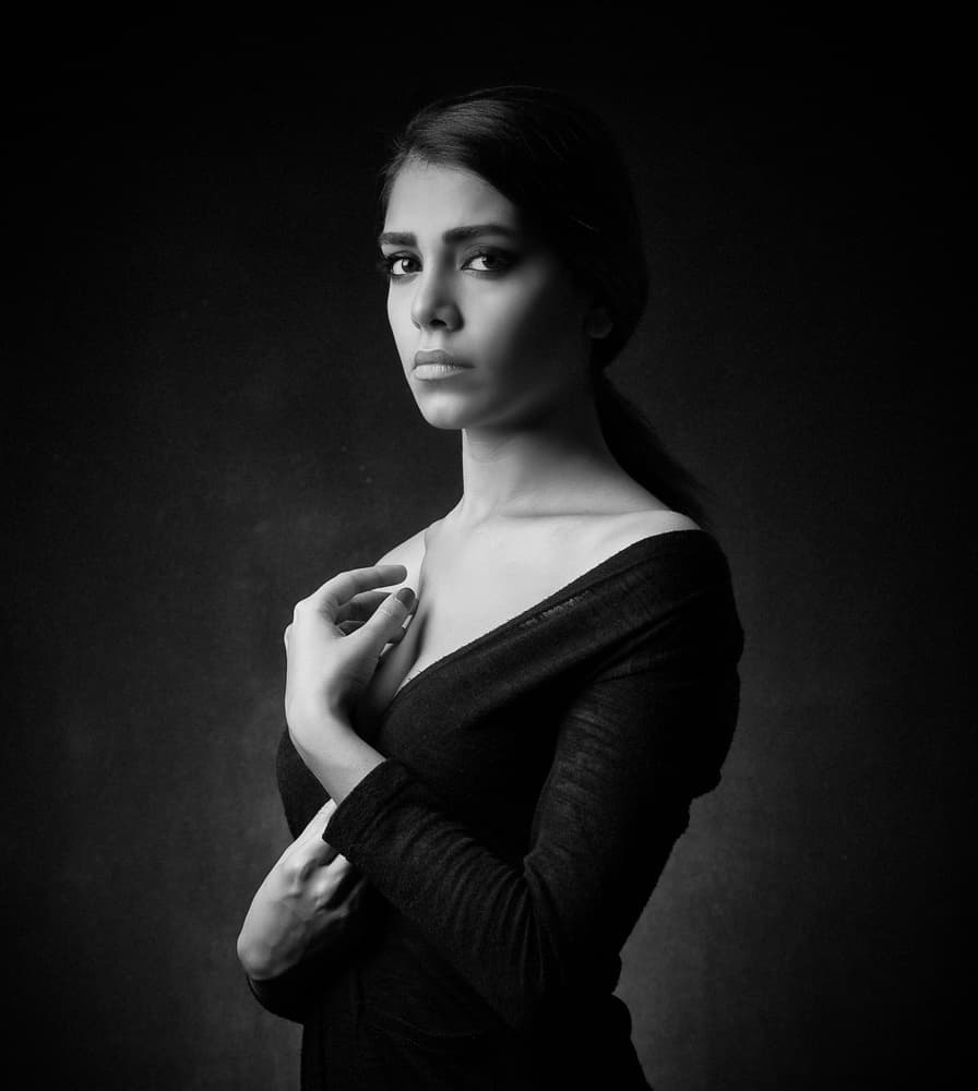 Pensive Woman's Gaze by Mehdi Mokhtari — canvas wall art