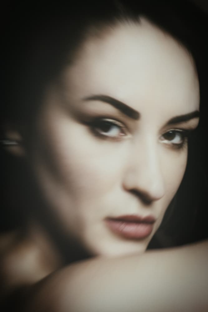 Mysterious Woman's Gaze by Christian Kurz — canvas wall art