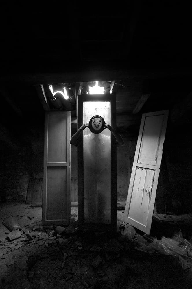 Mysterious Figure in Doorway by Carlo Ferrara — canvas wall art