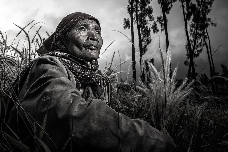 Elder Woman's Serene Gaze by Fauzan Maududdin — canvas wall art