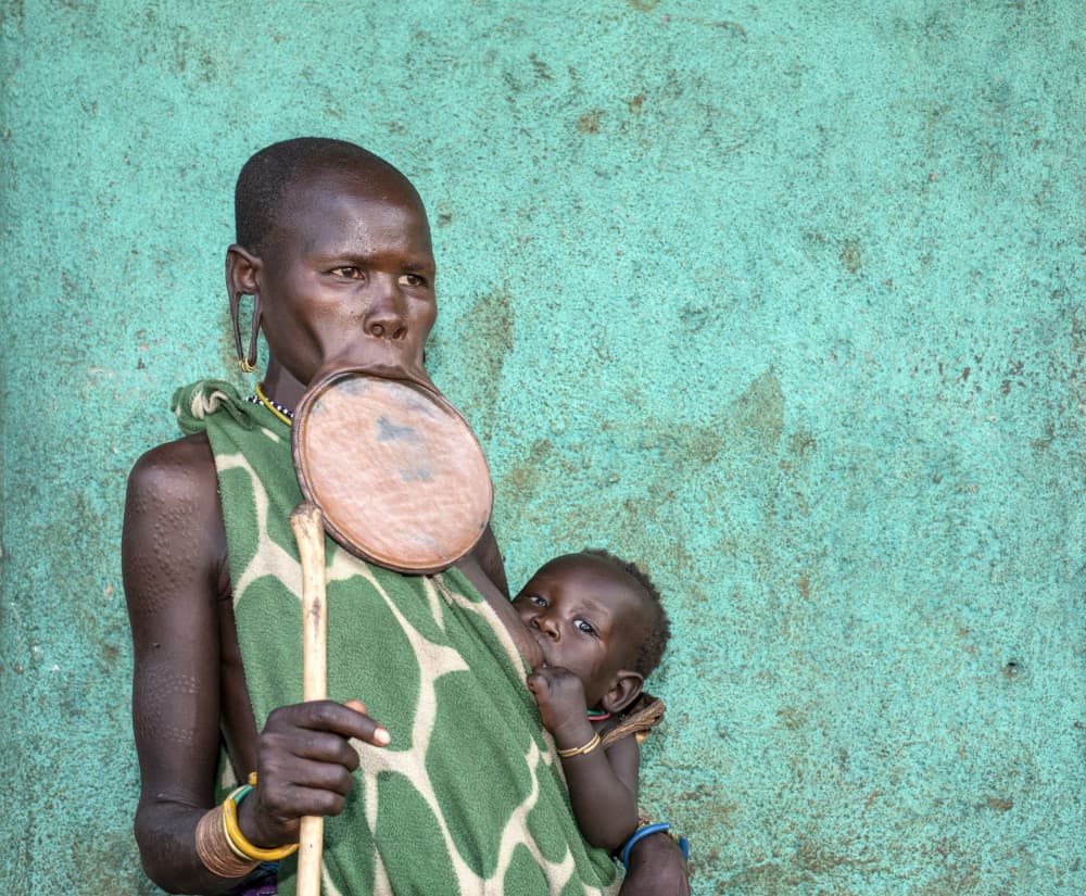 African Mother and Baby by Iris Wiener — canvas wall art