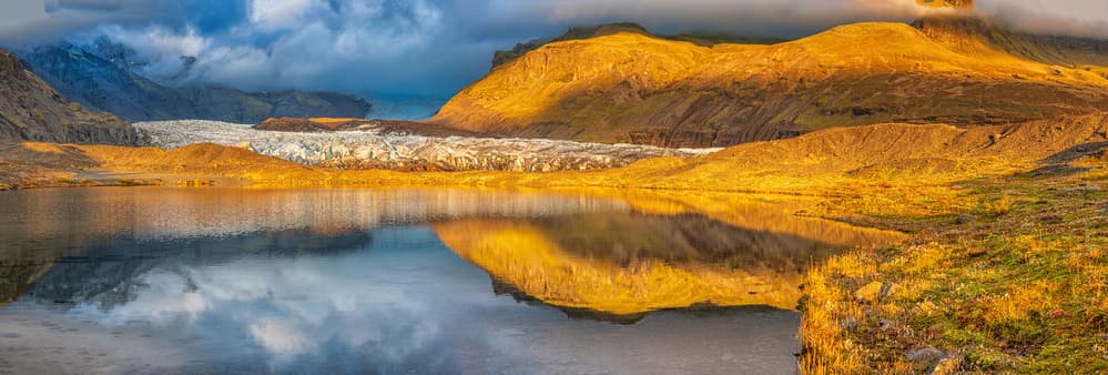 Golden Glacier Lake Reflection by Jeffrey C. Sink — canvas wall art