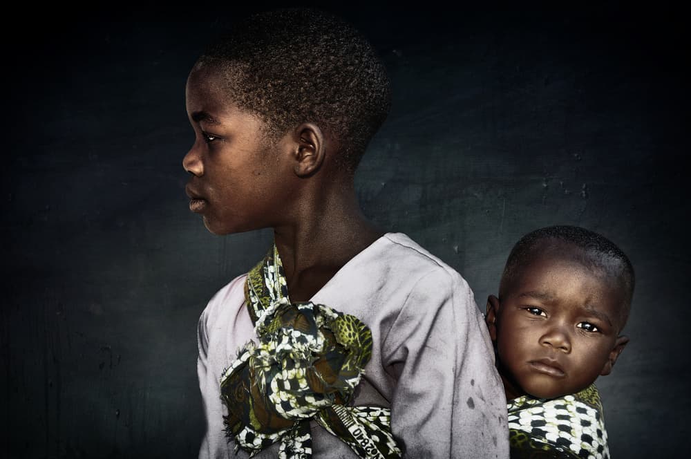 African Siblings Portrait by Antonio Grambone — canvas wall art