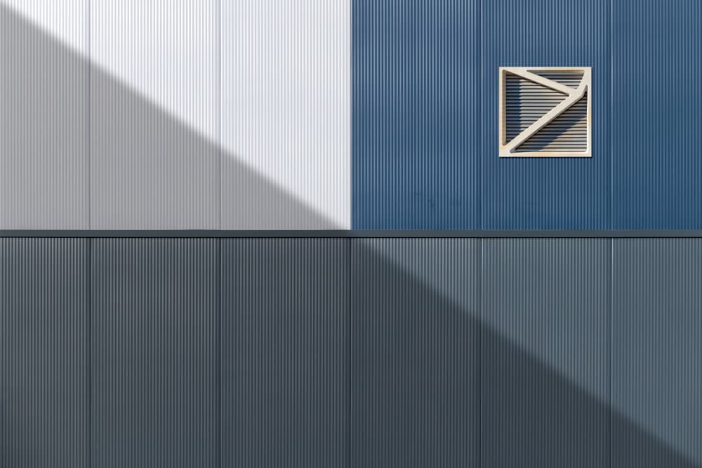Blue and Grey Facade by Andrea Comari — canvas wall art