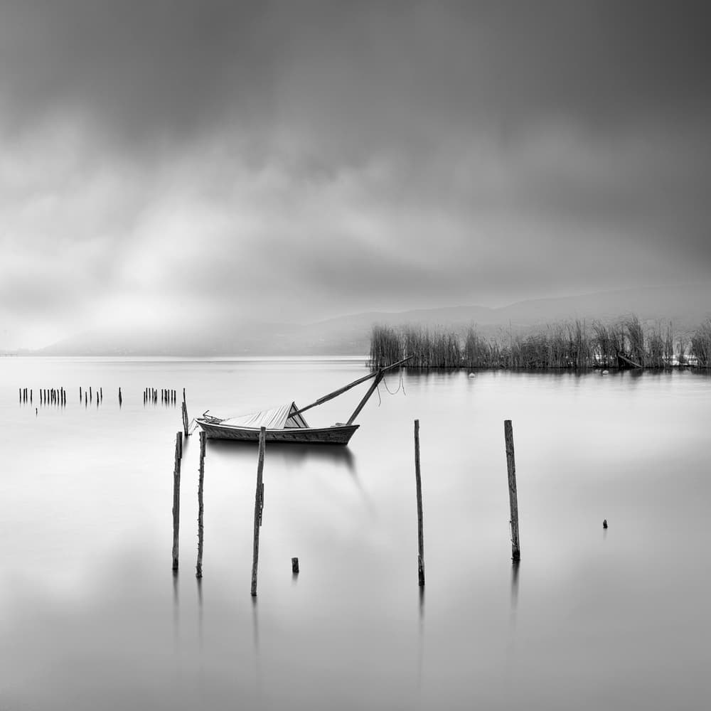 Misty Lake Boat by George Digalakis — canvas wall art