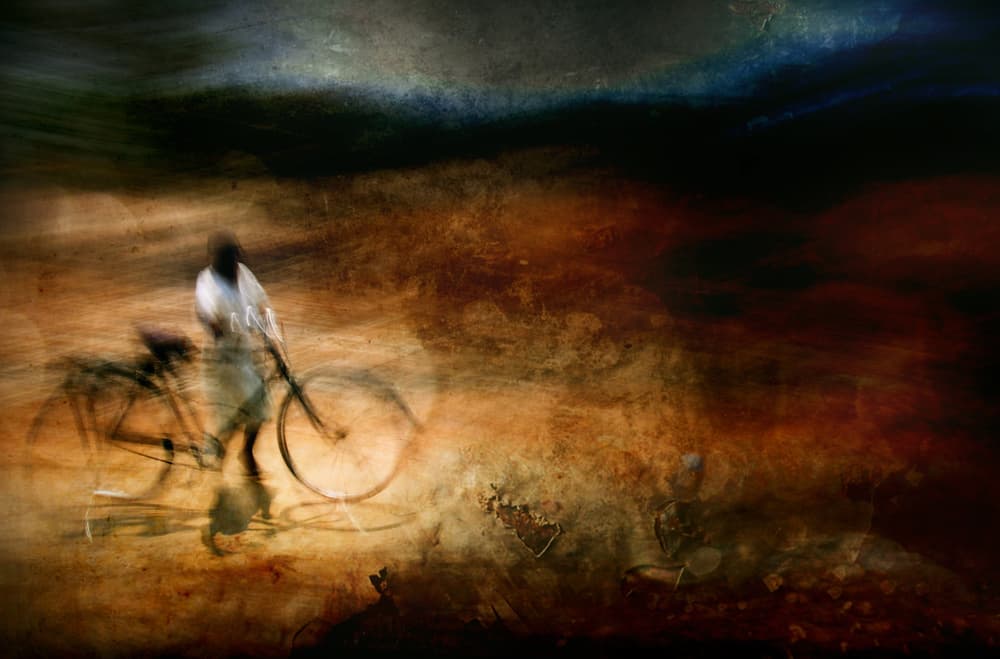 Blurred Bicycle Journey by Antonio Grambone — canvas wall art