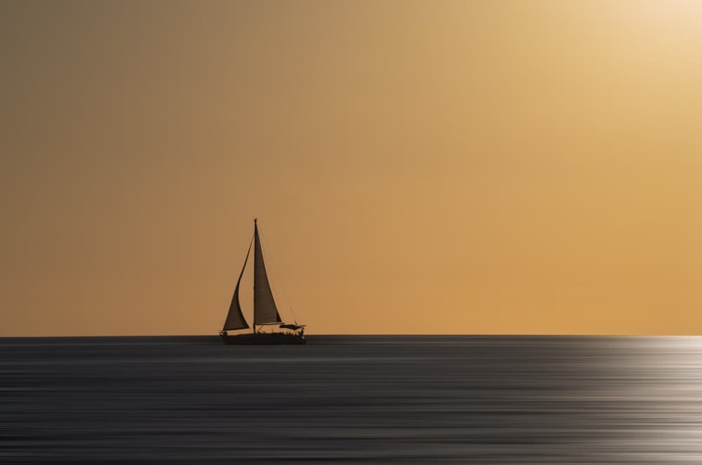 Golden Hour Sailboat by Dawn X W — canvas wall art