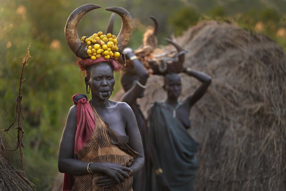 African Horned Headpiece by Sarawut Intarob — canvas wall art
