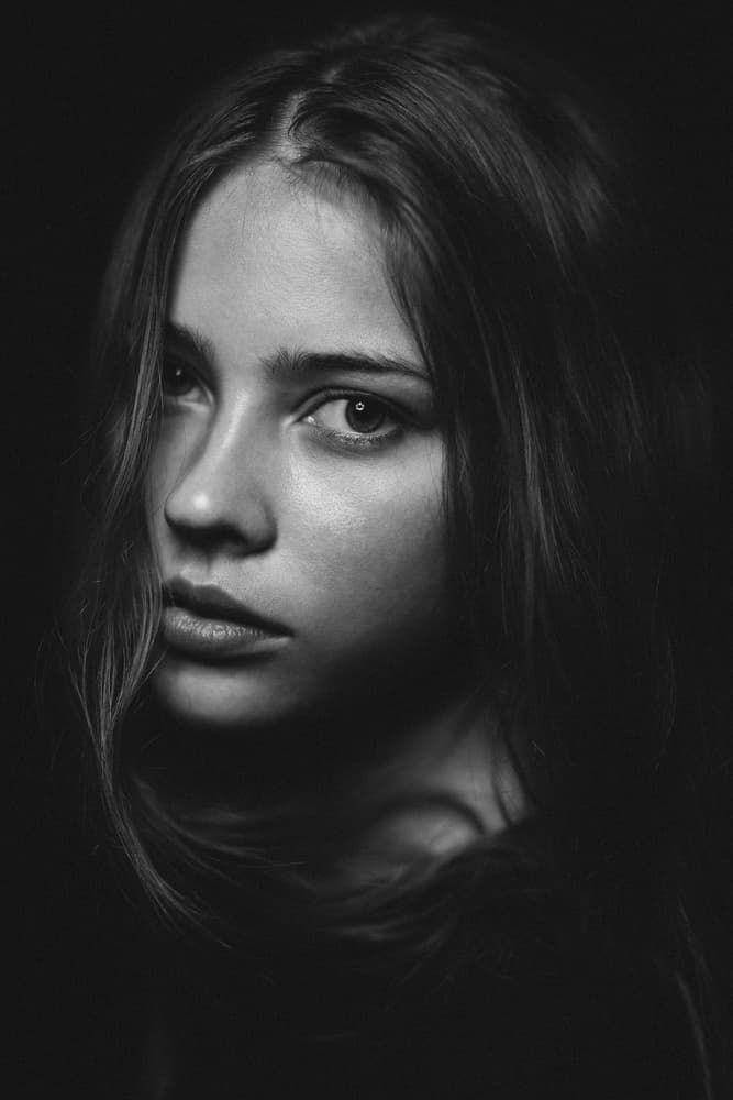 Pensive Young Woman by Artem Vasilenko — canvas wall art