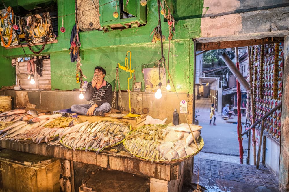 Asian Fish Market Vendor by Subhajit Das — canvas wall art