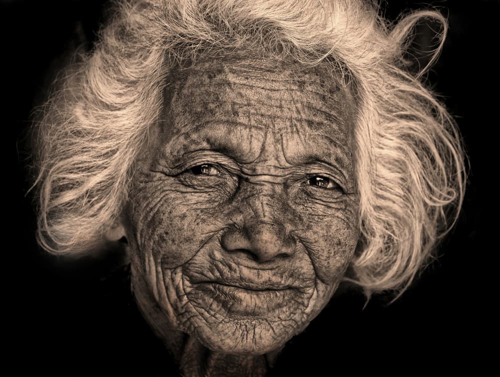 Wise Elderly Woman by Lou Urlings — canvas wall art