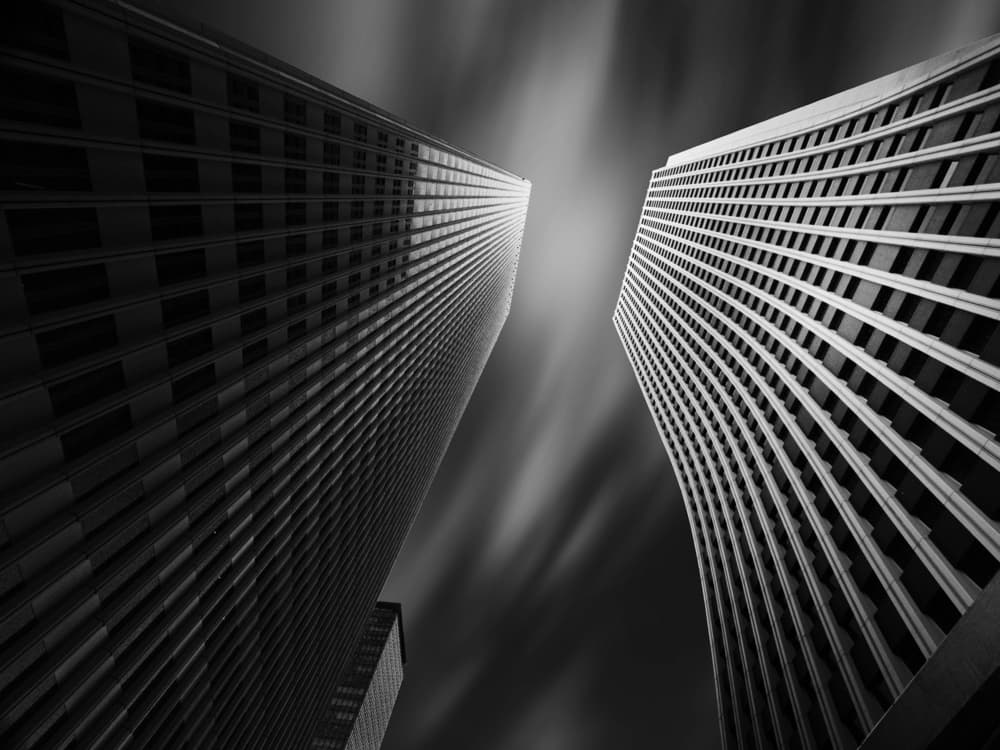 Towering City Drama by Yasuhiro Takachi — canvas wall art