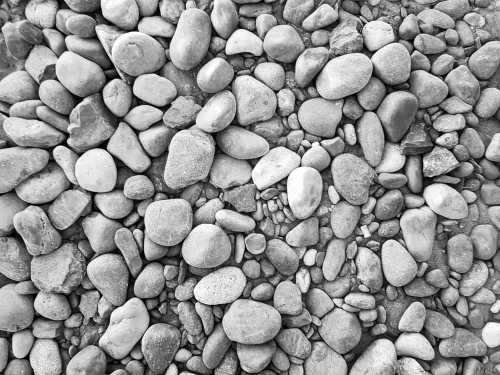 Smooth River Pebbles by Olea Huuska — canvas wall art