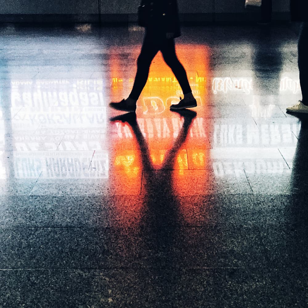 Silhouetted Urban Walk by Ali Ayer — canvas wall art
