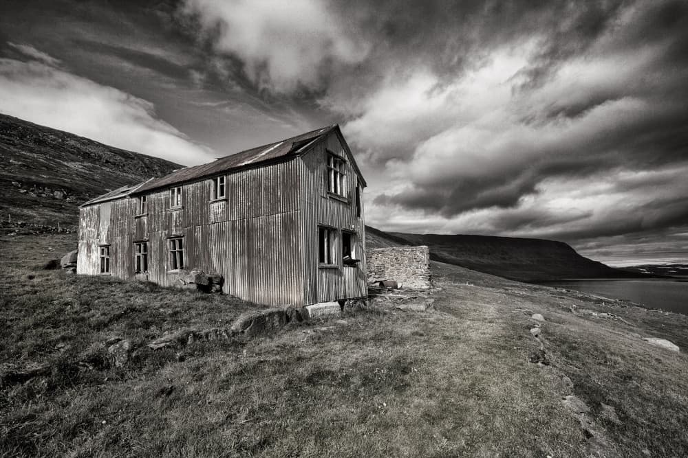 Solitary Coastal Building by Þorsteinn H. Ingibergsson — canvas wall art