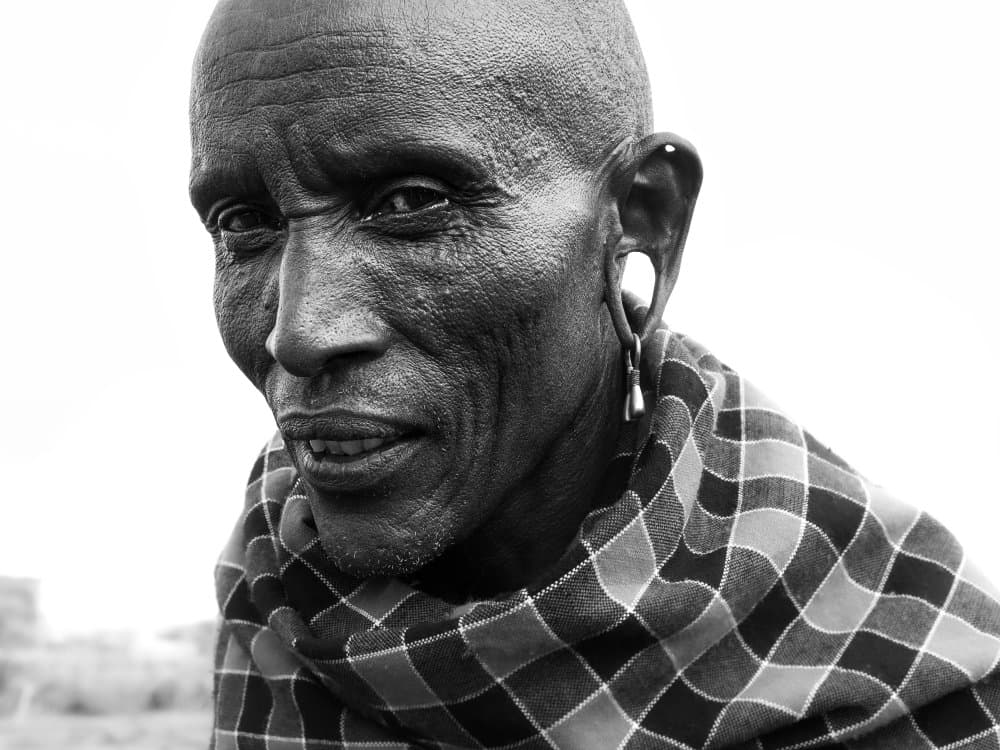 African Elder Portrait by Elena Molina — canvas wall art