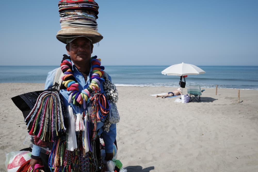 Colorful Beach Vendor by Carlo Tonti — canvas wall art