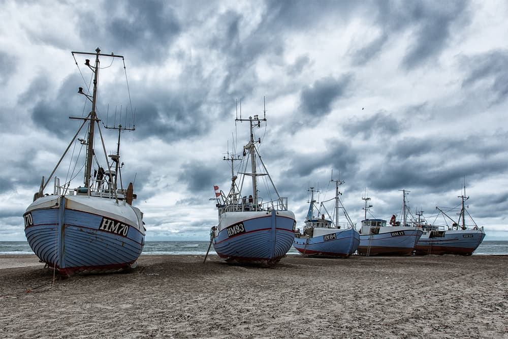 Beached Fishing Boats by Leif Løndal — canvas wall art