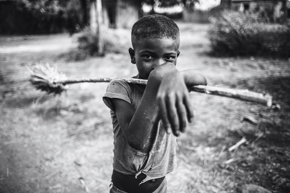 African Boy Direct Gaze by Marco Tagliarino — canvas wall art
