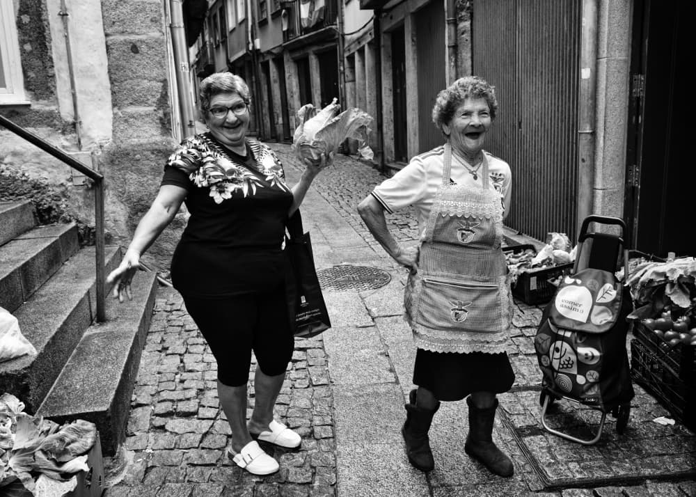 Smiling Market Women by Carlos Costa — canvas wall art