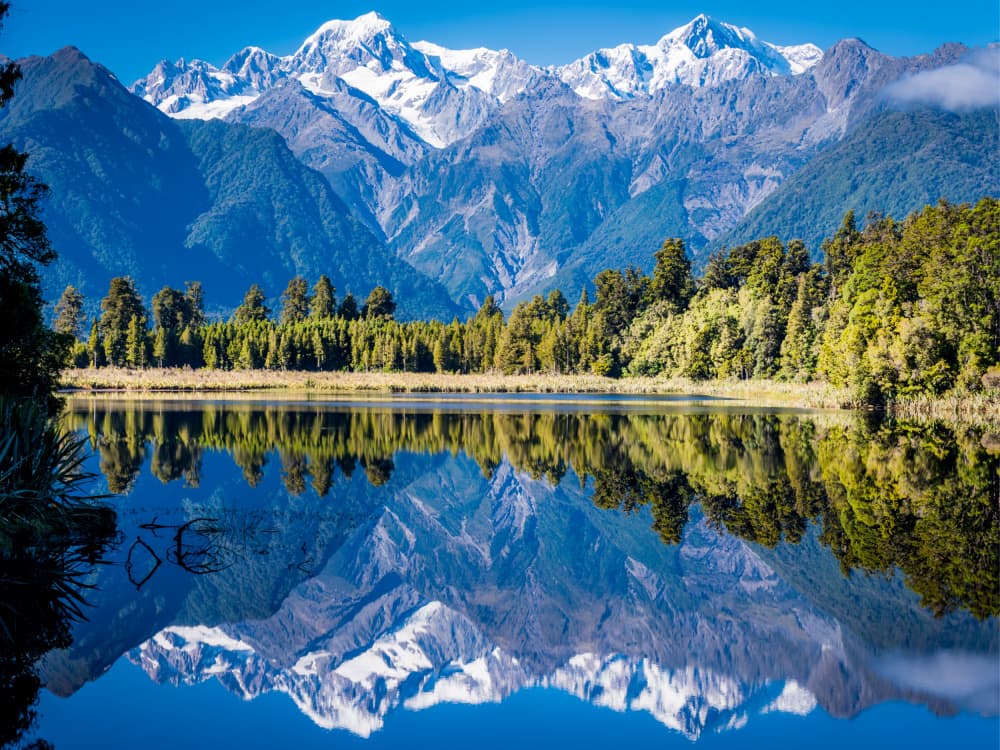 Serene Mountain Lake Reflection by Mathieu jeuf — canvas wall art