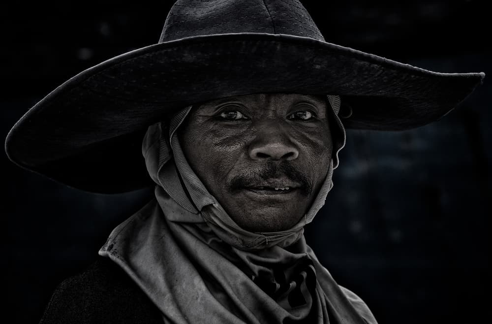 Intense Man Wide Hat by Joxe Inazio Kuesta Garmendia — canvas wall art