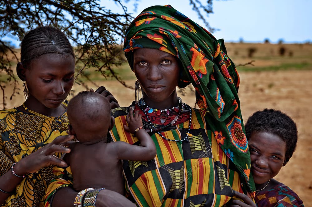 African Family Bonds by Joxe Inazio Kuesta Garmendia — canvas wall art