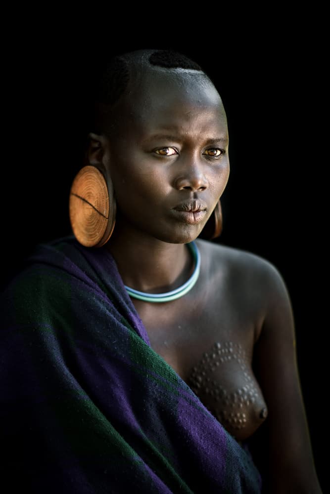 Mursi Woman Portrait by Trevor Cole — canvas wall art