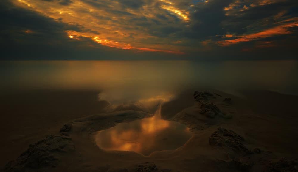 Moody Beach Sunset Reflection by paralaxa — canvas wall art